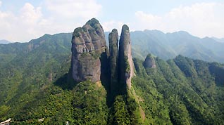 File photo taken on June 26, 2010 shows the scenery of Danxia Landform in east China's Zhejiang's Jianglangshan Mountains. The World Heritage Committee decided to include China Danxia Landform in the World Heritage List at its 34th meeting being held in Brasilia, capital of Brazil, on August 1, 2010.