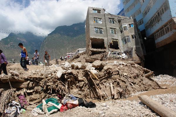 Buildings and roads hit by mudslides are seen in Zhouqu County, Gannan Tibetan Autonomous Prefecture in northwest China's Gansu Province, Aug. 8, 2010. 