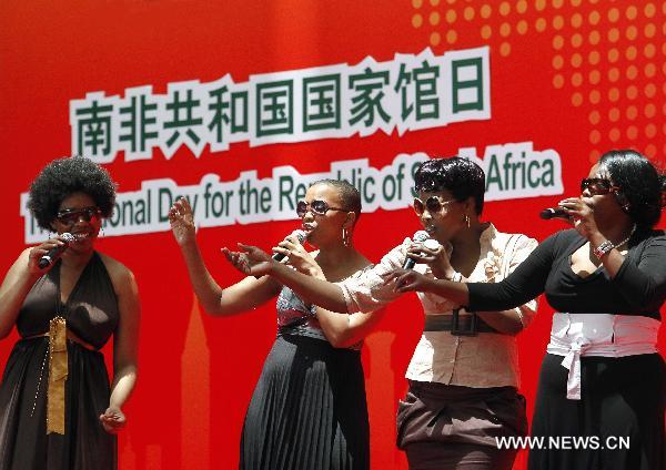 Artists from South Africa perform to celebrate the National Pavilion Day for South Africa at the World Expo in Shanghai, east China, Aug. 9, 2010.