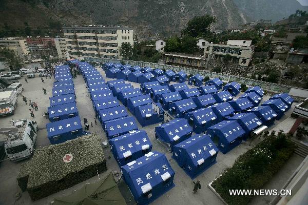 Disaster relief tents are seen at the No.3 Middle School in Zhouqu County, Gannan Tibetan Autonomous Prefecture in northwest China's Gansu Province, Aug. 10, 2010.