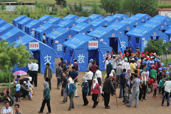 Makeshift tents are set up on the school playground for flood-affected residents in Tongxin County of Wuzhong City in Ningxia Hui Autonomous Region August 11, 2010.