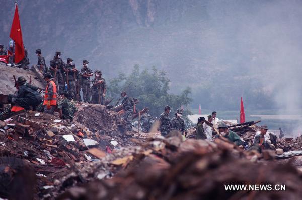 Soldiers prepare to rescue in relics of Zhouqu County, Gannan Tibetan Autonomous Prefecture in northwest China's Gansu Province, Aug. 12, 2010.