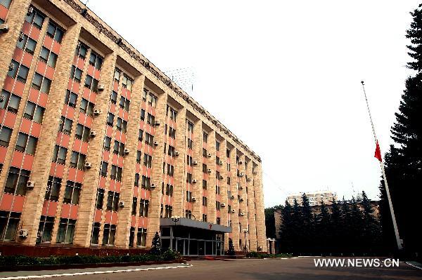 The national flag of China flies at half mast at the Chinese Embassy in Moscow, capital of Russia, Aug. 15, 2010, to mourn for the victims of the Aug. 8 mudslide disaster in Zhouqu County, Gannan Tibetan Autonomous Prefecture in northwest China's Gansu Province. 