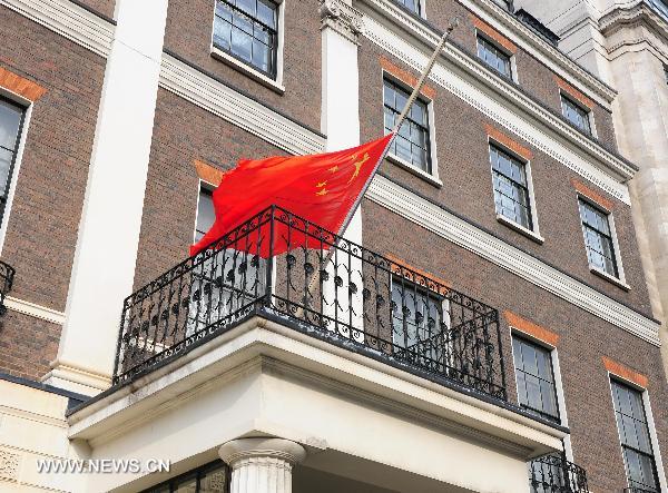 The national flag of China flies at half mast at the Chinese Embassy in London, capital of Britain, Aug. 15, 2010, to mourn for the victims of the Aug. 8 mudslide disaster in Zhouqu County, Gannan Tibetan Autonomous Prefecture in northwest China's Gansu Province.