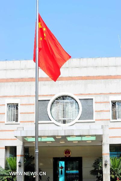 The national flag of China flies at half mast at the Chinese Embassy in Nairobi, capital of Kenya, Aug. 15, 2010, to mourn for the victims of the Aug. 8 mudslide disaster in Zhouqu County, Gannan Tibetan Autonomous Prefecture in northwest China's Gansu Province. 