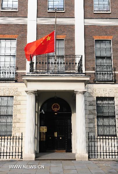 The national flag of China flies at half mast at the Chinese Embassy in London, capital of Britain, Aug. 15, 2010, to mourn for the victims of the Aug. 8 mudslide disaster in Zhouqu County, Gannan Tibetan Autonomous Prefecture in northwest China's Gansu Province