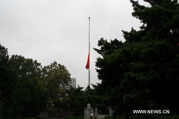 The national flag of China is seen at half mast at the Chinese Embassy to the Democratic People's Republic of Korea (DPRK) in Pyongyang Aug. 15, 2010, to mourn for the victims of the Aug. 8 mudslide disaster in Zhouqu County, Gannan Tibetan Autonomous Prefecture in northwest China's Gansu Province. 