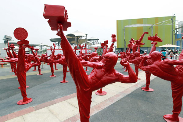 Ceramic statues of Chinese kungfu practitioners are on display at Shanghai Expo Park, Aug 17, 2010. 