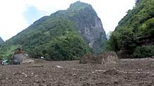 Photo taken on Aug. 18, 2010 shows the mudslides site in Puladi Township of Gongshan Drung-Nu Autonomous County, southwest China's Yunnan Province.