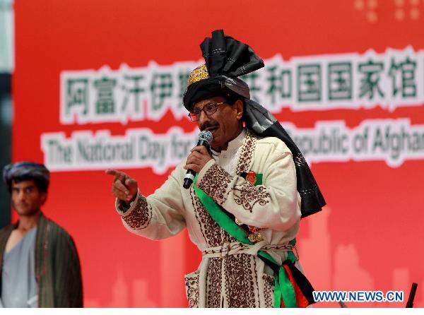An artist from the Republic of Afghanistan sings during a ceremony celebrating the National Pavilion Day of the Republic of Afghanistan at the 2010 World Expo in Shanghai, east China, Aug. 19, 2010.