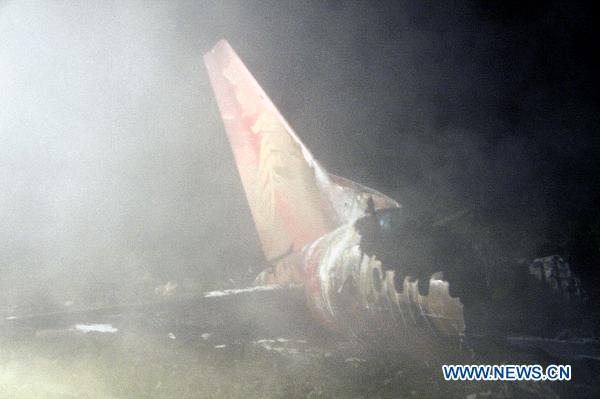 The wreckage of a crashed passenger plane is seen in Yichun City, northeast China&apos;s Heilongjiang Province, Aug. 25, 2010.