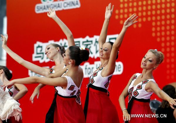Ukraine's artists perform during a ceremony marking the National Pavilion Day of Ukraine at the 2010 World Expo in Shanghai, east China, Aug. 24, 2010.