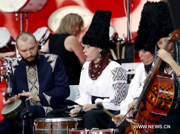 Ukraine's artists perform during a ceremony marking the National Pavilion Day of Ukraine at the 2010 World Expo in Shanghai, east China, Aug. 24, 2010.