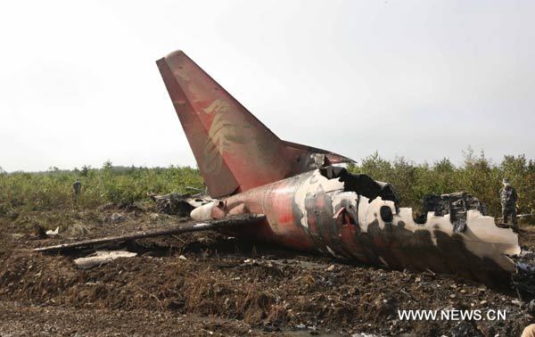 Photo taken on Aug. 25, 2010 shows the site where a passenger plane crashed in Yichun City, northeast China's Heilongjiang Province, Aug. 25, 2010. 