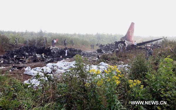 Photo taken on Aug. 25, 2010 shows the site where a passenger plane crashed in Yichun City, northeast China's Heilongjiang Province, Aug. 25, 2010. 