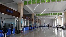 Photo taken on Aug. 25, 2010 shows an empty hall in the Lindu Airport after the administration temporarily closed the airport in Yichun City, northeast China's Heilongjiang Province.