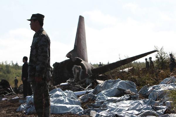 Photo taken on Aug. 25, 2010 shows the site where a passenger plane crashed in Yichun City, northeast China&apos;s Heilongjiang Province.