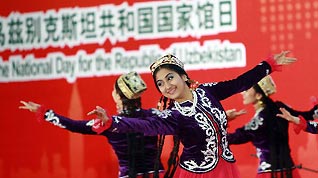 Dancers perform during a ceremony marking the National Pavilion Day for Uzbekistan at the 2010 World Expo in Shanghai, east China, Aug. 31, 2010.