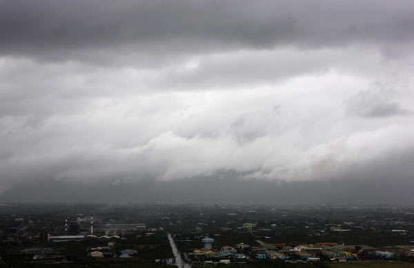Clouds gather above Taiwan's Hualien city as tropical storm Lionrock approaches, September 1, 2010. 