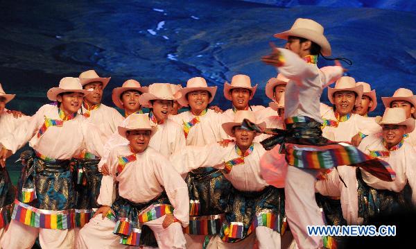 Dancers perform at the opening ceremony of the Tibet Week in World Expo Park in Shanghai, east China, Sept. 1, 2010. 