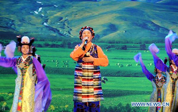 Singers perform at the opening ceremony of the Tibet Week in World Expo Park in Shanghai, east China, Sept. 1, 2010. 