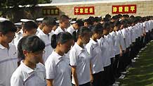 Stendents attend a ceremony to commemorate the 65th anniversary of the end of World War II in Shanghai, China, Sept 3, 2010.