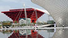 Photo taken on Sept. 1, 2010 shows the China Pavilion (L) and its inverted image after a rainfall in the World Expo Park in Shanghai, east China.