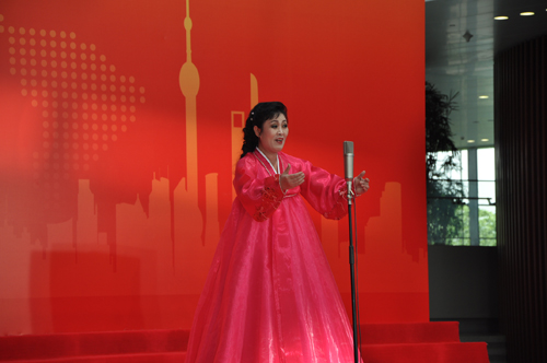 A singer from the Pyongyang Art Troupe stages a performance at the Democratic People&apos;s Republic of Korea (DPRK) Pavilion Day at the Shanghai World Expo on Monday, September 6, 2010. 