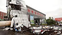 The photo taken on Sept. 10, 2010 shows an advertisement board torn down by the typhoon Meranti in downtown Shishi, southeast China's Fujian Province.