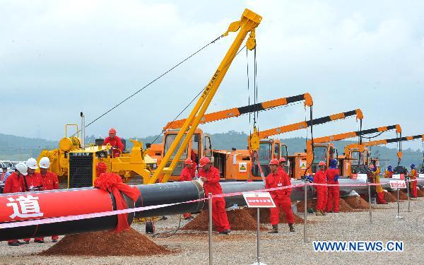 Constructors work at the project as the China-Myanmar oil and gas pipelines formally started Chinese section construction in Anning of Southwest China's Yunnan province, on Sept. 10, 2010. 