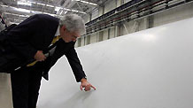 Patricio Lopez, president of Virtual University of Mexico, visits a plant of Vestas Wind Technology (China) Co., Ltd., during an industry tour as a program of the World Economic Forum (WEF) Annual Meeting of the New Champions 2010, in north China's Tianjin Municipality on Sept. 14, 2010.