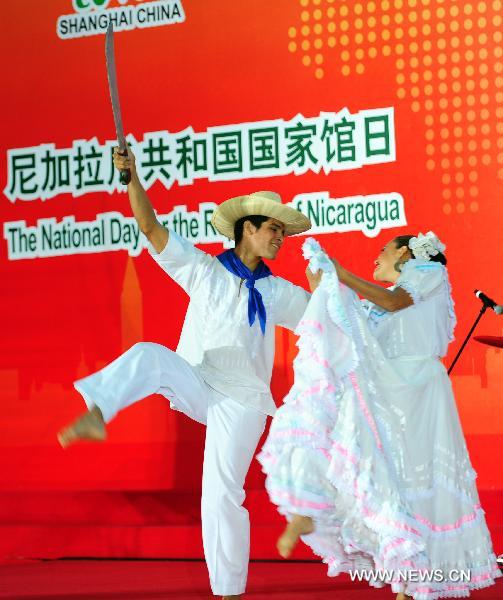 Artists from Nicaragua perform during a ceremony marking the National Pavilion Day of the Republic of Nicaragua in the Shanghai World Expo Park in Shanghai, east China, Sept. 14, 2010. 