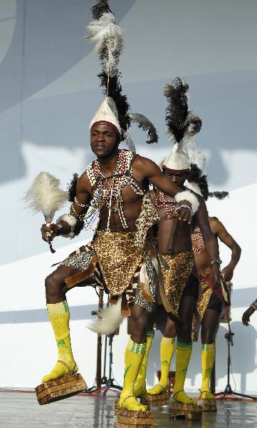 Kenyan dancers perform traditional dance in the Shanghai World Expo Park in Shanghai, east China, Sept. 16, 2010. 
