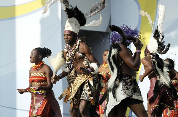 Kenyan dancers perform traditional dance in the Shanghai World Expo Park in Shanghai, east China, Sept. 16, 2010. 