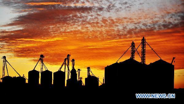 Photo taken on Sept. 18, 2010 shows granaries in the Farm 856 in northeast China&apos;s major rice producing province of Heilongjiang.