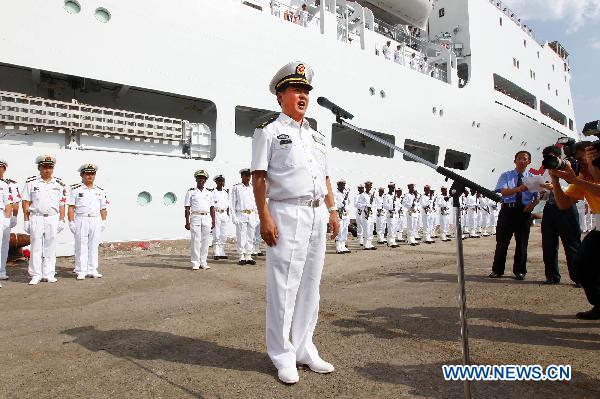 Deputy Commander of the Chinese Navy Lieutenant General Xu Hongmeng announces the beginning of medical service in Djibouti, Sept. 22, 2010. The Chinese navy hospital ship &apos;Peace Ark&apos; arrived in Djibouti on Wednesday to provide seven-day medical treatment for locals.