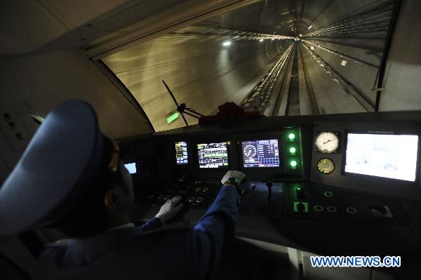 A driver works in the cab on the newly opened subway line in Chengdu, capital of southwest China's Sichuan Province, Sept. 27, 2010.