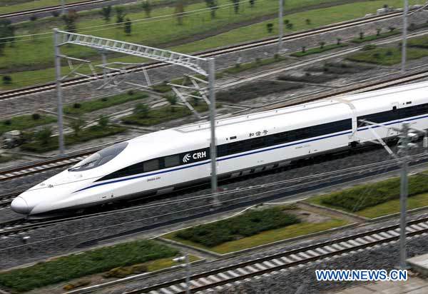 A train departs from Hongqiao Railway Station in Shanghai, east China, Sept. 28, 2010. The train CRH380A which on Tuesday started trial operation on the Shanghai-Hangzhou High-Speed railway set a new speed record of 416.6 kilometers per hour. 