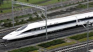 A train departs from Hongqiao Railway Station in Shanghai, east China, Sept. 28, 2010. The train CRH380A which on Tuesday started trial operation on the Shanghai-Hangzhou High-Speed railway set a new speed record of 416.6 kilometers per hour.