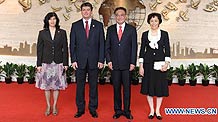 Wu Bangguo (2nd R), chairman of the Standing Committee of China's National People's Congress, China's top legislature, and his wife Zhang Ruizhen (1st R) pose for a group photo with Albanian President Bamir Topi and his wife.