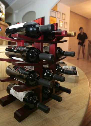 Bottles of red wine are displayed at a chateau in Nanjing, Jiangsu Province. Societe Generale is launching a wine fund on Chinese mainland.