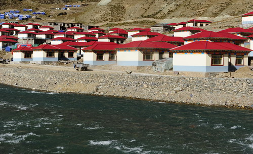 The newly-built homes with a view of the water in Yushu County, northwest China's Qinghai Province, on Thursday Oct 7, 2010. 