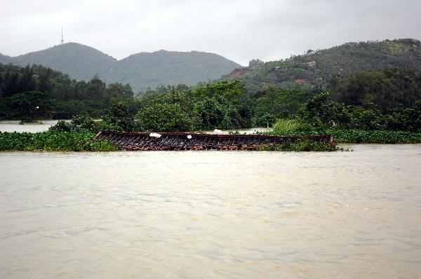 Photo taken on Oct. 7, 2010 shows a submerged house in Wancheng Township of Wanning, south China's Hainan Province. Heavy rainfall in Wanning since Sept. 30 has afflicted 357,700 residents. 