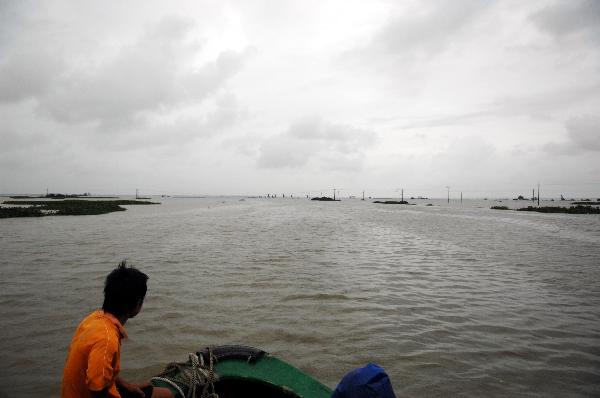 Photo taken on Oct. 7, 2010 shows a submerged house in Wancheng Township of Wanning, south China's Hainan Province. Heavy rainfall in Wanning since Sept. 30 has afflicted 357,700 residents. 