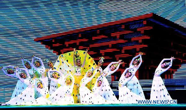 Actresses perform dancing during the opening ceremony of the Shanghai Week of the 2010 World Expo in Shanghai, east China, Oct. 8, 2010.
