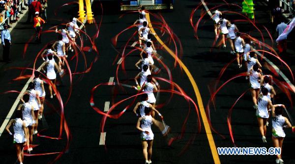 Photo taken on Oct. 8, 2010 shows a cruise performance of the Shanghai Week of the 2010 World Expo in Shanghai, east China. 