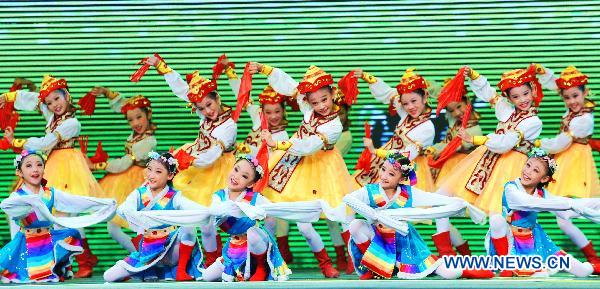 Children perform dancing during the opening ceremony of the Shanghai Week of the 2010 World Expo in Shanghai, east China, Oct. 8, 2010. 