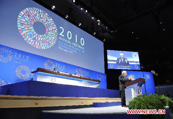 Dominique Strauss-Kahn, managing director of International Monetary Fund (IMF), addresses the opening ceremony of the Plenary Session of the Annual Meetings of the International Monetary Fund (IMF) and World Bank in Washington, the United States, Oct. 8, 2010.