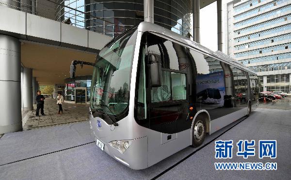 A BYD K9 Full Automatic Coach stops at the 2010 Changsha Science and Technology Achievements Transformation Fair in Changsha, capital of central China's Hunan Province, Oct. 11, 2010. 