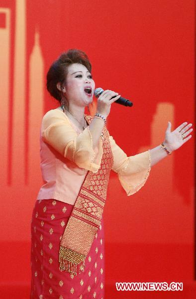 A singer performs for the National Pavilion Day for the Lao People's Democratic Republic in World Expo Park in east China's Shanghai on Oct. 12, 2010.